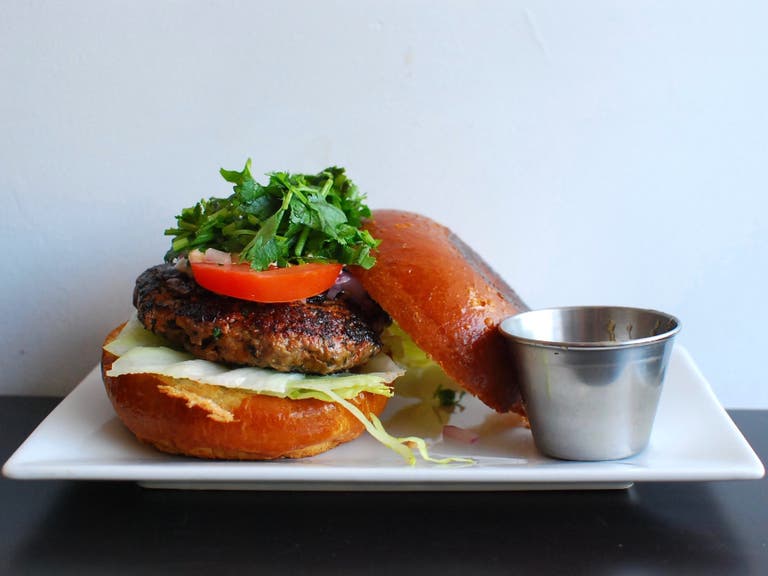 Spiced lamb burger at Badmaash | Photo by Joshua Lurie